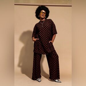 Dresses in LALA Leveled Up Ribbed Playsuit in Black + Mocha Checkerboard